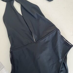 Like new! Women’s medium black rip curl swimsuit